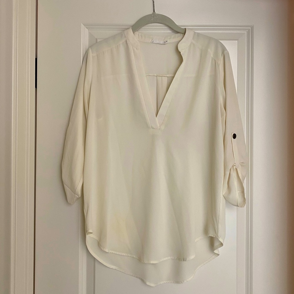 Lush cream roll-tab sleeve hi-low tunic blouse